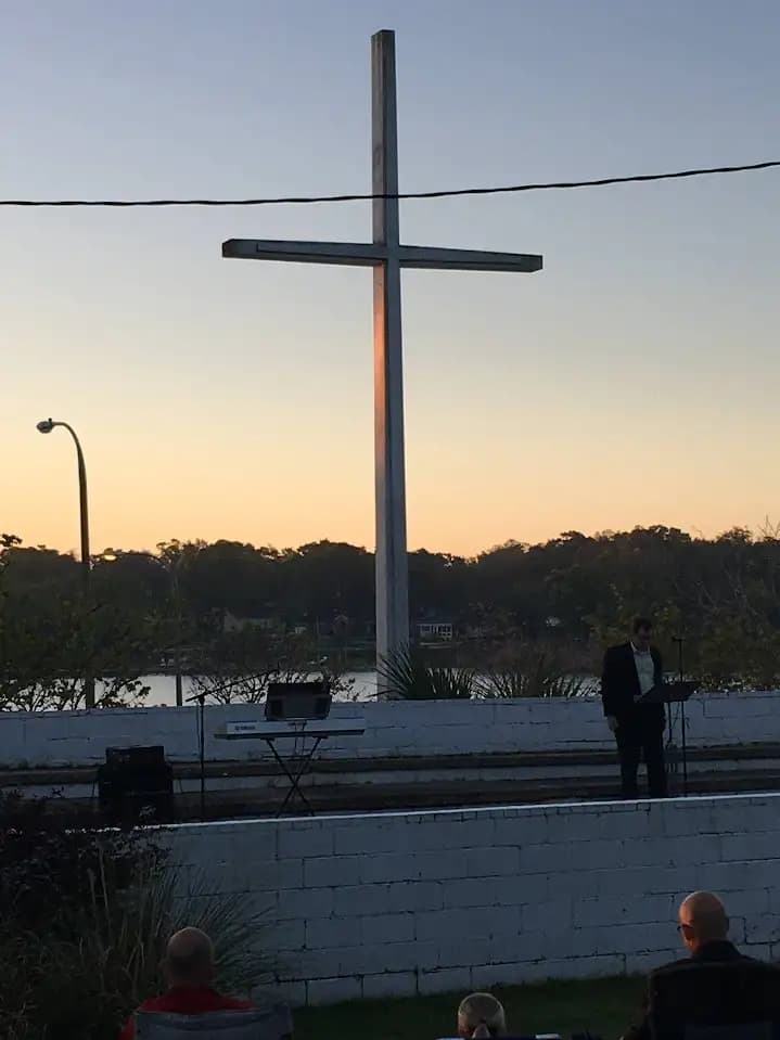 The cross at McIlwain against the evening sky